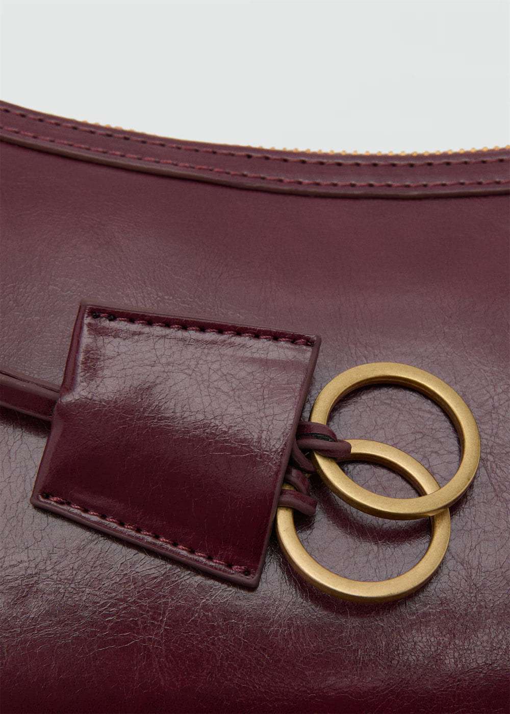 Crossbody bag with charms and rings – Bild 6